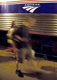 Passengers deboard the Hoosier State Amtrak train at the depot, in Lafayette, on Wednesday, August 14, 2013. / Brent Drinkut/Journal &amp; Courier
