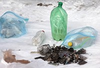 Jordan Kartholl/ The Star Press: Eight suspects were detained in a meth lab raid at 1520 E. Second Street Friday morning. Two children were transported from the home in an ambulance before investigators searched the home. One of the suspects, police believed to be a meth "cook", was transported to Muncie EMS Station No. 3 for a decontamination procedure.