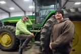 Evan Schildmier (right, with his dad, Doug), is the only one of his siblings who has gone into the family business of farming. "For my generation, they don't want to stay on the farm," said Evan, 27. (Tom Russo / Daily Reporter)