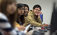 Saw Eh talks about a credibility issue as a group of Burmese students visit a journalism class&nbsp; at BHS South. Staff photo by David Snodgrass