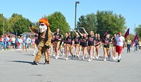 The Maconaquah High School Braves mascot, Dave the Brave, waves to the crowd during the school's homecoming parade in September. Peru Tribune photo by Chad Abshire.