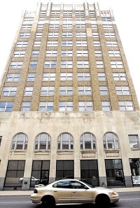 The Tower Apartment building was purchased at auction and remodeled by Youri and Olga Frakine. Staff photo by John P. Cleary