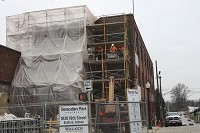 BEDFORD &mdash; Construction work continues on the future Stonecutter&rsquo;s Place building at 16th and K streets. According to the city&rsquo;s timeline, construction of the senior apartment complex will continue through 2015, with occupancy scheduled for early 2016. Staff photo by Garet Cobb