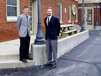 Mark Crook (left) and Grant Bell (right) stand beside Napoleon Center where their new valet service, Prime Parking Solutions, will start offering car parking in January. The two Valparaiso students will start with Stacks Bar &amp; Grill in the building and plan to add three more restaurants by March. | James D. Wolf Jr./for Sun-Times Media