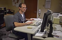 Schneck Medical Center lead CT Technologist Todd Hazard works on a diagnostic imaging machine on Wednesday at the Seymour hospital. Lung cancer has surpassed breast cancer as the most common form of cancer in 2014. Staff photo by Aaron Piper