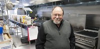 Terry Cockerham no longer operates an onsite banquet venue but caters as many as 600 events a year from his new kitchen at the village. Staff photo by David Snodgress