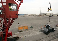 Longshoremen work to remove coils of steel from the hold of the Federal Nakagawa following the ship's arrival in April at The Port of Indiana-Burns Harbor, which had a record year in 2014. Staff photo by John Luke