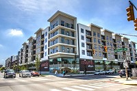 Pictured is Flaherty &amp; Collins Properties' Axis development in Indianapolis, one of several in that city and the Midwest. The company has plans for a similar mixed-use apartment, retail and restaurant venture at the former Coyle property along Spring Street in downtown New Albany. Photo courtesy of Flaherty &amp; Collins Properties