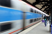 Passengers disembark from a southbound Metra commuter train in Homewood, where village officials are pitching the Metra/Amtrak station there as a prime asset for businesses that locate nearby. Staff photo by John J. Watkins