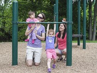 Katherine Mowat and her wife Mandy Harrison with their two daughters at Morrow's Meadow in Yorktown Wednesday. (Photo: Jordan Kartholl/The Star Press)