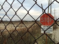 The gate at the former Indiana Steel and Wire property, where officials hope a shell building, part of a proposed industrial redevelopment, might spark growth.(Photo: Keith Roysdon / The Star Press)
