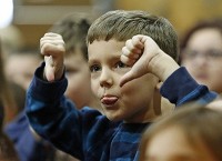Parkside Elementary kindergartener Asher Mehl reacts to&nbsp; wrong answer during a Family Feud-style game during the ISTEP+ rally Monday to get kids prepared to take the test. Staff photo by Michael Caterina