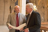 Sen. Luke Kenley, left, talks with Indiana Manufacturers Association President Brian Burton at the Statehouse. (IBJ photo/Eric Learned)