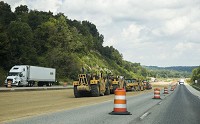 Construction equipment belonging to Crider &amp; Crider sits idle Tuesday along Ind. 37 on the I-69 extension between Bloomington and Martinsville. Staff photo by Jeremy Hogan