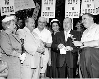 Save the Dunes founder Dorothy Buell, left, meets with regional leaders supporting the creation of the national lakeshore. Joining her, from left, were East Chicago Mayor Walter Jeorse, unidentified man, Whiting Mayor Mayor Mary Bercik, Chicago Mayor Richard J. Daley and Gary Mayor George Chacharis. Photo courtesy Calumet Regional Archives at Indiana University Northwest
