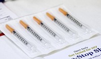 New needles, which clients can get as part of the needle exchange program, at the Austin Community Outreach Center are displayed in Austin in this file photo.