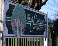 A sign makrs the entrance to the West Calumet Complex in East Chicago. Staff file photo by Damian Rico