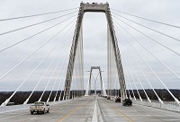 A group of the first commuters to travel over the Lewis and Clark Bridge following its opening ceremony on Sunday, Dec. 18, 2016. Staff photo by Tyler Stewart