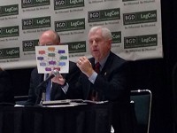 State Sen. Ed Charbonneau, R-Valparaiso, holds a chart showing all the agencies and reporting relationships responsiblefor overseeing water in Indiana. Staff photo by Dan Carden