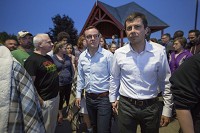 South Bend Mayor Pete Buttigieg walks with his partner Chasten Glezman during a vigil to remember those killed in the mass shooting at an Orlando, Florida, nightclub. Staff file photo by Santiago Flores