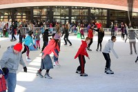 People ice skate at the Central Park Plaza Ice Rink in downtown Valparaiso, a city where the population has grown by 18 percent since 2000. Officials say the growing communities in Northwest Indiana have nice amentiies like the ice skating rink, newer homes and easy commutes to work. Staff photo by Damian Rico