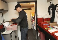 Indiana Recovery Alliance Director Chris Abert makes preparations for visitors to the Lawrence County needle exchange van Tuesday afternoon, Jan. 31, 2017. Staff photo by Garet Cobb