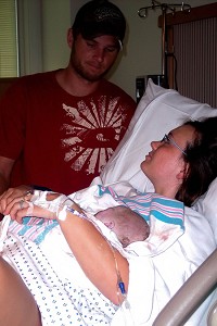 Sarah Morrison, of Vincennes is seen with her husband, Joshua, and late son, Silas, in 2008. Morrison now counsels other families dealing with the loss of a baby. Provided photo