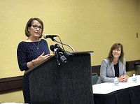 SUMMIT:&nbsp;Indiana Chief Justice Loretta Rush, left, and Dr. Jennifer Walthall, Secretary of the Indiana Family and Social Services Administration, discuss the agenda for a statewide opioid summit held Wednesday in Indianapolis.&nbsp;CNHI News Indiana by Scott L. Miley