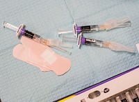Vials of a hepatitis A vaccine sit on a table inside the Wayne County Health Dept.'s multipurpose room before they are administered during a clinic on Thursday, July 19, 2018.&nbsp;&nbsp;Mickey Shuey/Palladium-Item,