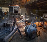 A steelworkers oversees an operation at ArcelorMittal's Indiana Harbor operations. More than half of the steel mill jobs in Lake County have vanished since 1990. Provided photo