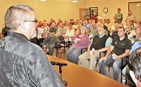 Jennings County Council President Mike Kelley (R-District 1) addresses an overflow crowd at Tuesday&rsquo;s public hearing.&mdash;Staff Photo by Bryce Mayer