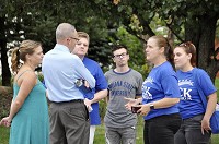 Tobi Beck, second from right, Democratic candidate for Indiana's 4th Congressional seat, talks with voters and supporters while canvassing a Plainfield neighborhood. CNHI News Indiana photo by Scott L. Miley
