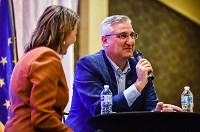 Gov. Eric Holcomb participated in a question-andanswer session with One Southern Indiana&rsquo;s Wendy Dant Chesser on Thursday as part of 1si&rsquo;s Governor&rsquo;s Luncheon event at the Radisson Louisville North Hotel. Staff photo by Tyler Stewart