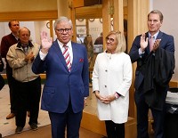 Sen. Ron Alting and his wife Pam arrive to applause of supports Tuesday, November 6, 2018, at the County Office Building. Alting defeated Democrat challenger Sherry Shipley for the District 22 Senate seat. Staff photo by John Terhune
