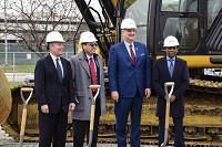 From the left: Indianapolis Mayor Joe Hogsett, Indianapolis International Airport Executive Director Mario Rodriguez, Indiana Governor Eric Holcomb and Infosys president Ravi Kumar ceremonially break ground on a $35 million education and training center built by the company as part of its $245-milion campus project. CNHI photo by Gus Pearcy