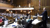 Indiana Speaker of the House Brian Bosmaaddresses House members on Organization Day Tuesday setting a challenging tone for the upcoming session. Staff photo by John P. Cleary