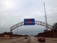 A sign on the Borman Expressway welcomes people to Indiana. The state added more than 31,000 residents this year. Staff photo by&nbsp;Joseph S. Pete 