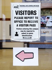 A sign directs visitors to the office of Anderson Elementary School. Staff photo by Don Knight