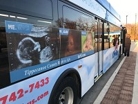 A Tippecanoe County Right to Life advertisement, once rejected by CItyBus, was back on the 1B route bus this week, as seen Tuesday, March 12, 2019, at the CityBus terminal in downtown Lafayette. Right to Life sued CityBus over the ad's rejection. The case was settled and dismissed March 12.&nbsp;(Photo: Dave Bangert/Journal &amp; Courier)