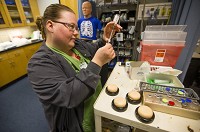 Nursing student Justine Cole works on drawing insulin Tuesday at Ivy Tech Community College in South Bend. Staff photo by Michael Caterina
