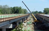 Construction of Interstate 69 continues on the 4,400-foot Patoka River Bridge as representatives for INDOT offer a tour and gives updates to the media about the Interstate 69 project Wednesday. The stretch of Interstate 69 from Evansville to Crane could be completed and open to traffic as early as mid-November. Staff photo by Jason Clark

&nbsp;
