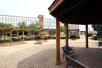 Once planned as a site for a local bank headquarters, Citizen's Plaza now occupies half a city block across from the Madison County Government Center. Though it's available for rent, few community events take place in the downtown park. Staff photo by Tim Bath