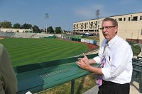 Dan O&rsquo;Connell, president of the Visit Fort Wayne tourism outreach talks about the public-private downtown endeavor known as Harrison Square which included a new hotel, Parkview Field, which is home of the Fort Wayne TinCaps minor league baseball club, a parking garage with about 700 spaces, a 43-unit apartment complex with balconies overlooking the baseball field, and retail and restaurant space just across the street from the Grand Wayne Convention Center. Staff photo by Jason Clark