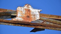 A sign celebrating the opening of Bridge 45 across the West Fork of the White River recalls the local officials involved in its construction. The county commissioners in 1903 were O.M. Vance, R. D. Smith and W. H. McCarter, while the county auditor at the time was Robert Russell and the county engineer Edward C. Faith. The structure was built by the Indiana Bridge Co. of Muncie, which did a lot of work in the county in the late 19th and early 20th centuries. Staff photo by Gayle R. Robbins