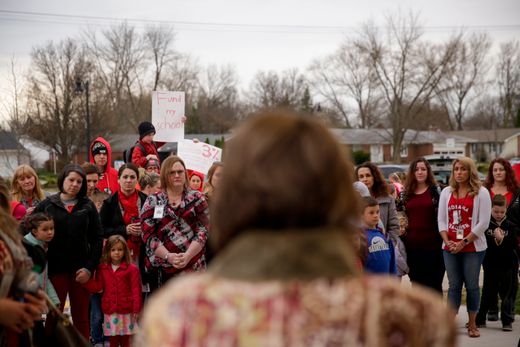 Teachers and community members listen as state Rep. Chris Campbell, D-West Lafayette, speak, Wednesday, April 10, 2019, at Cumberland Elementary School in West Lafayette. Greater Lafayette teachers and community members gathered outside schools before walking in to demand teacher salary raises. (Nikos Frazier | Journal & Courier)