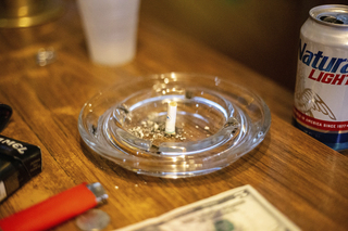 THE SMOKING PROBLEM: A stubbed out cigarette inside the American Legion post in Fairmount. According to Marion General Hospital, 31 percent of Grant County adults smoke cigarettes. This is nearly double the national smoking rate of 17.5 percent. Staff photo by Clay Winowiecki