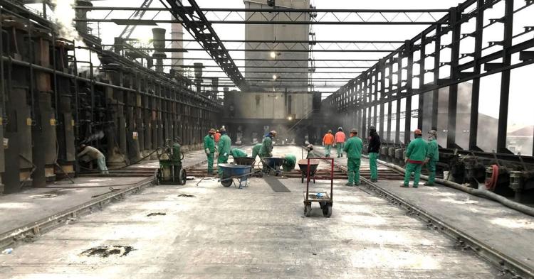 Workers repair the roof of the No. 2 coke battery at ArcelorMittal Burns Harbor in Porter County. Provided photo