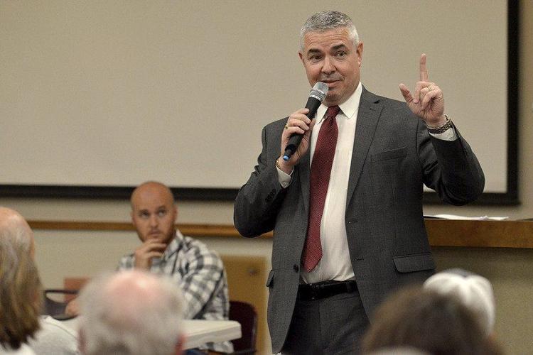 His experience with a new jail: Saginaw County Sheriff William Federspiel describes the layout of his Michigan county’s previous jail during his presentation on Thursday at the Vigo County Public Library. Staff photo by Joseph C. Garza