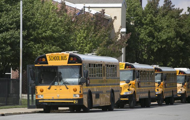 South Bend schools bus drivers line up. 
Tribune Photo/SANTIAGO FLORES