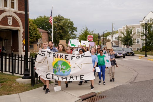 School to the city library during climate change strike, Friday, Sept. 27, 2019, in West Lafayette. About 300 students and community members marched from West Students walk from West Lafayette Jr./Sr. High School to the West Lafayette library and then to Happy Hollow School calling for climate change action. Nikos Frazier | Journal & Courier